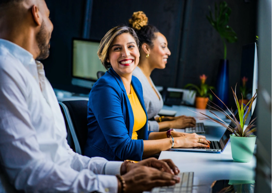 Engaged employees interacting during work